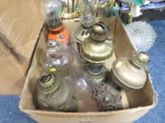 Three trays of assorted oil lamps and light fixtures A/F