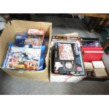 Two boxes of assorted Jigsaws puzzles together with a tray of postcards etc (3)