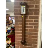A reproduction mahogany inlaid stick barometer H 95 cm