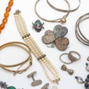 A selection of silver, gold-cored metal, and bead jewellery items.