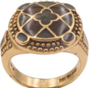 A Celtic-style silver gilt and enamel signet ring.