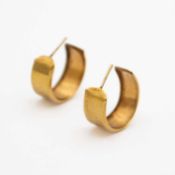 A pair of 9k gold wide hoop earrings.