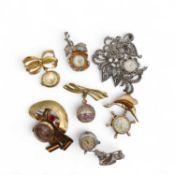 A selection of seven brooch watches.