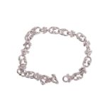 Georg Jensen - A diamond-set ‘Magic’ link bracelet, designed by Regitze Overgaard, comprising a