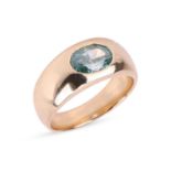 A greenish-blue diamond ring, featuring a flush-set greenish-blue oval modified brilliant-cut