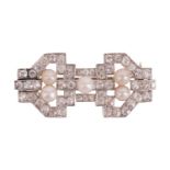 An Art Deco natural pearl and diamond brooch, of geometric openwork design, encrusted with old-cut