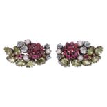 Attributed to Dorrie Nossiter - a pair of gem-set floral spray clip earrings, featuring a ruby