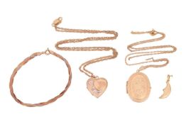 A small group of jewellery items comprising a 9ct yellow gold oval hinged locket, to a yellow metal 