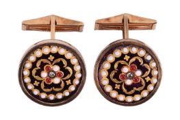 A pair of diamond and enamel cufflinks in gilt metal, the circular panels centred with a trefoil mot