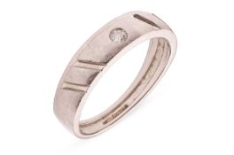 A diamond-set band, featuring a gypsy-set round brilliant diamond with an estimated carat weight of 