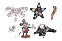A group of signed costume jewellery to include paste-set brooches by Bulter and Wilson, in the form 
