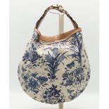 "Blue Flora Canvas Wave Hobo Bag", Gucci.