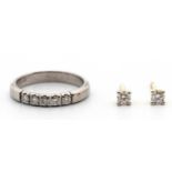 A diamond five stone ring and a pair of solitair earstuds.