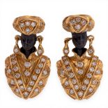 Nardi, a pair of blackamoor ear studs.