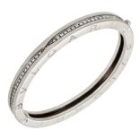 A 'B.Zero1' diamond bangle by Bulgari, hinged and set throughout with brilliant-cut...