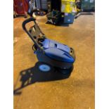 Crafted floor scrubber used it needs a new brush from underneath great little workhorse battery