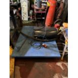 3 phase table lift that can sit in the ground it is new unused and works perfect it is 1.5 x 1.15 in