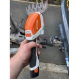 Stihl little pruner for shearing shrubbery good little tool no charger but battery with it