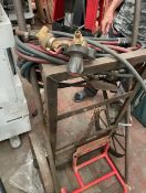 Oxy acetylene bottle cart with the hoses and bright taps pressure adjusters