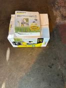 Karcher hose reel and a karcher hose pipe set up on the wall and reel in and out keep your hose pipe