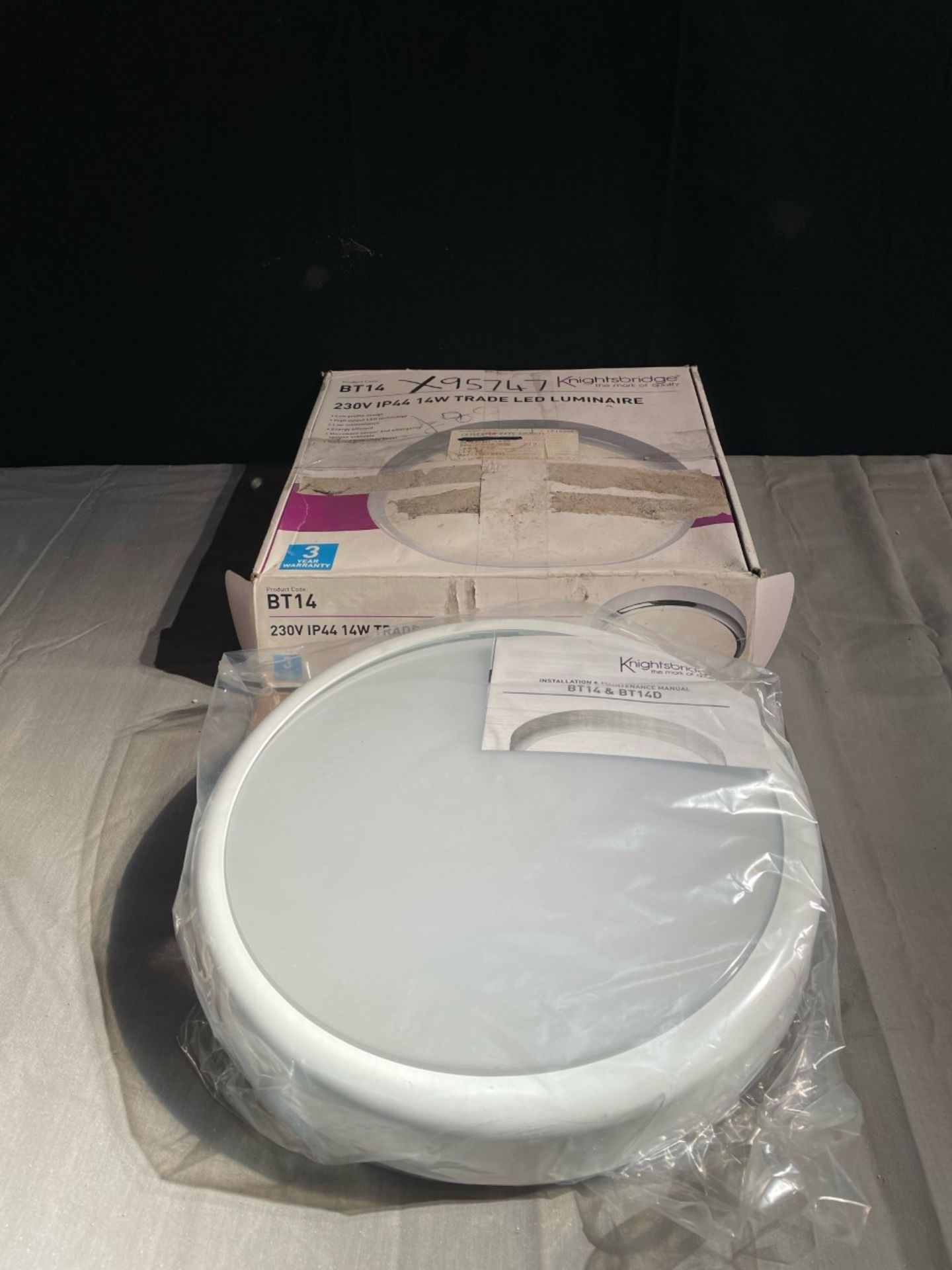 1x new Knightsbridge 230v IP44 14W LED bulkhead.