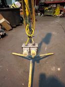 110v tripod strip light with 2 outlets. 2ft light