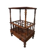 A VICTORIAN BURR WALNUT CANTERBURY rectangular top over three section platform base with ring turned