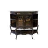 A LATE VICTORIAN EBONISED CREDENZA Single frieze drawer, over two swag decorated glazed cabinet