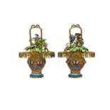 A FINE PAIR OF CHINESE SILVER-GILT AND ENAMEL FLOWERING BASKETS 20TH CENTURY 20cm high PROVENANCE: