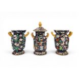 A PAIR OF MASON'S VASES, boldly decorated in meandering blooms and butterflies on a blue ground with