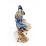 A JAPANESE PORCELAIN GROUP  LATE MEIJI PERIOD depicting the bodhisattva Kannon riding a dragon