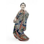 A LARGE JAPANESE KUTANI FIGURE  MEIJI PERIOD (1868-1912) modelled as a Bijin wearing a long