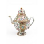 A LARGE CANTON FAMILLE ROSE TEAPOT QING DYNASTY, 19TH CENTURY decorated in the typical palette  29.