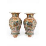A FINE A LARGE PAIR OF JAPANESE KUTANI VASES MEIJI PERIOD (1868-1912) each painted with large panels