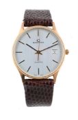 Y GARRARD, A 9 CARAT GOLD WRISTWATCH WITH DATE