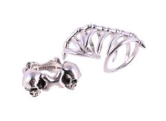 STEPHEN WEBSTER, A 'SKULL AND BONES' SILVER RING AND A 'VERENE KNUCKLE' RING