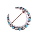A TURQUOISE AND DIAMOND CRESCENT BROOCH