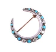 A TURQUOISE AND DIAMOND CRESCENT BROOCH