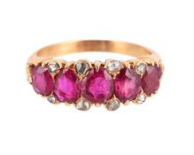 A RUBY AND DIAMOND FIVE STONE RING