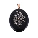 A LATE 19TH CENTURY HALF SEED PEARL AND ONYX LOCKET PENDANT