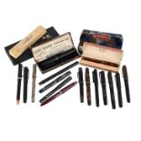 A COLLECTION OF PENS AND PENCILS