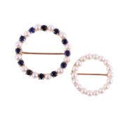 TWO CIRCLET BROOCHES