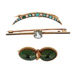 A GROUP OF THREE BROOCHES