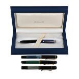 PELIKAN, THREE FOUNTAIN PENS AND A BALLPOINT PEN
