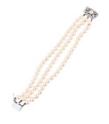 A CULTURED PEARL AND DIAMOND BRACELET