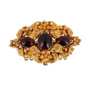 AN EARLY VICTORIAN GARNET CLASP WITH LATER BROOCH FITTING