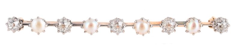 AN EDWARDIAN DIAMOND AND HALF PEARL BAR BROOCH