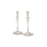 A PAIR OF GEORGE III SILVER CANDLESTICKS