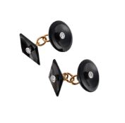 A PAIR OF ONYX AND DIAMOND CUFFLINKS