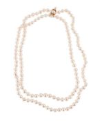 A CULTURED PEARL NECKLACE WITH CULTURED PEARL AND DIAMOND ACCENTED SPACER